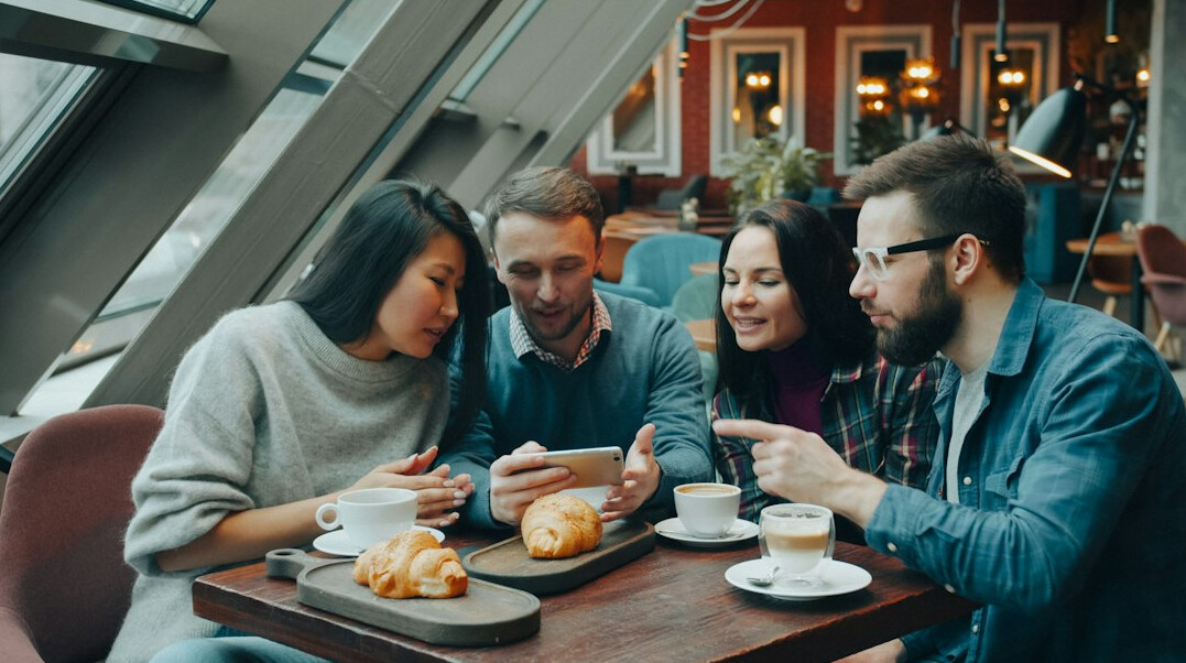 group of friends talking cafe